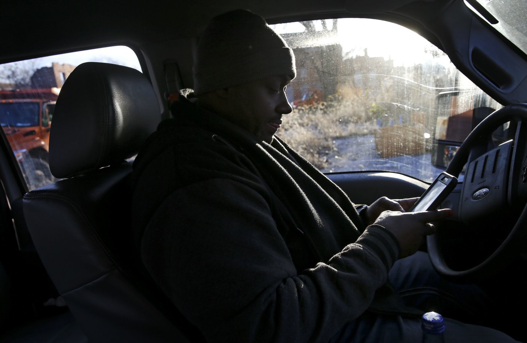 Foreman Tony Stokes checks in with the office after responding to a CSB complaint